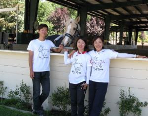 Students pose with Ben before sidewalking for a Hippotherapy session